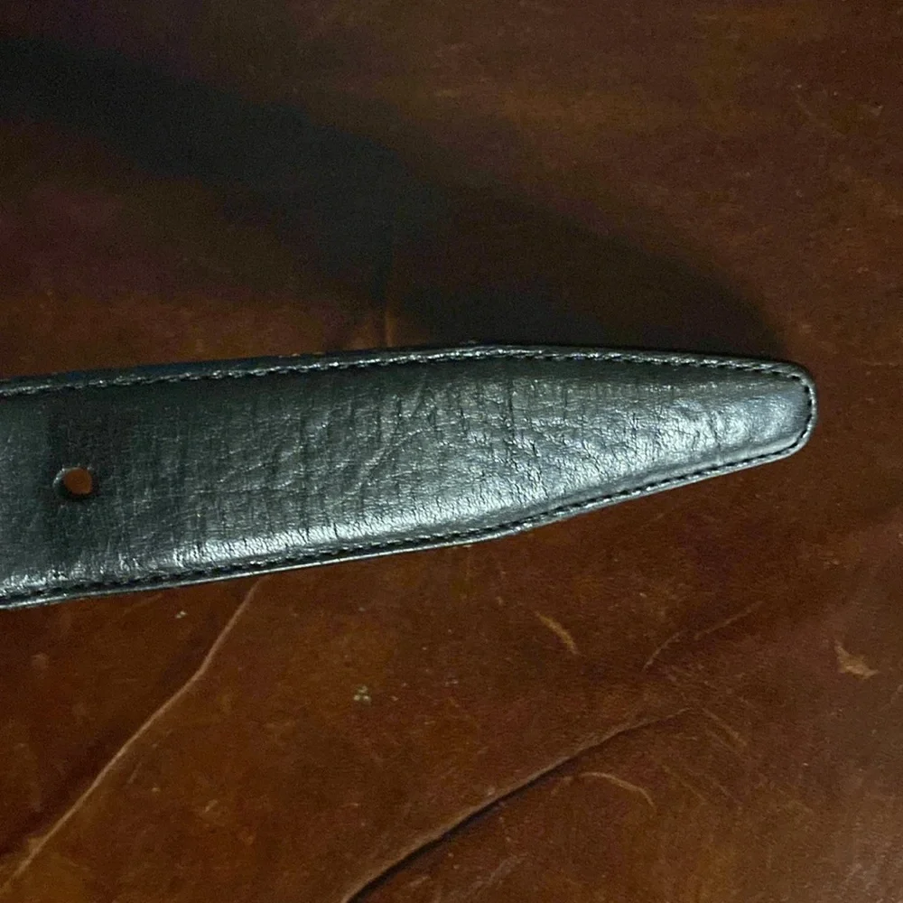 Men’s Wearhouse black Italian full grain leather belt size 44 silver tone